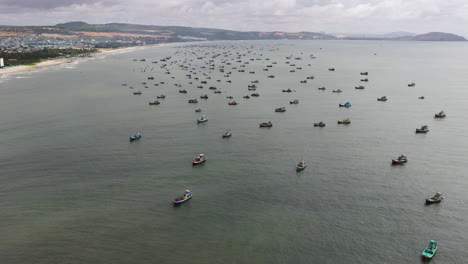 many fishing boats gather off the coast of vietnam while an issue of overfishing looms