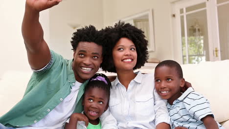 happy family taking a selfie