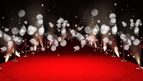 animación de puntos blancos sobre alfombra roja y luces