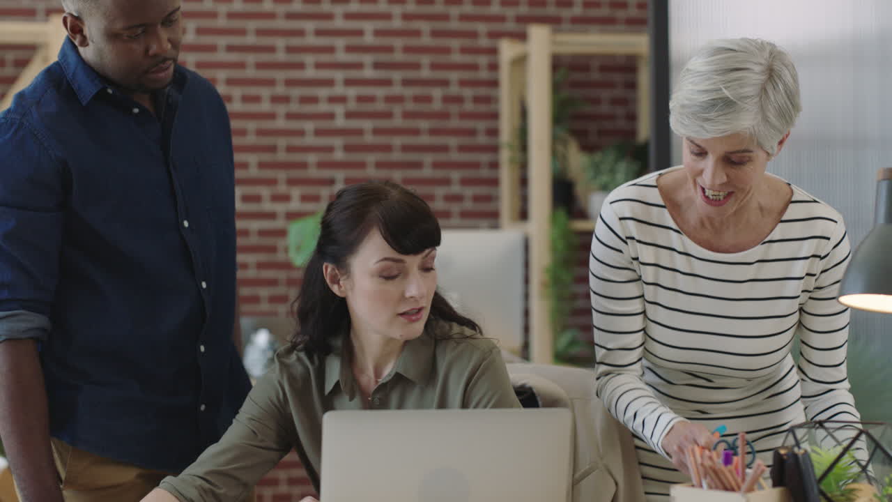 multi ethnic business people brainstorming creative strategy for start up company collaborating sharing notes in modern office workspace