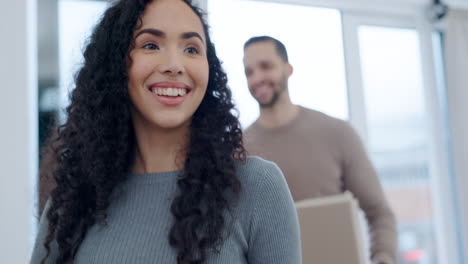 Moving,-box-and-couple-smile-for-real-estate