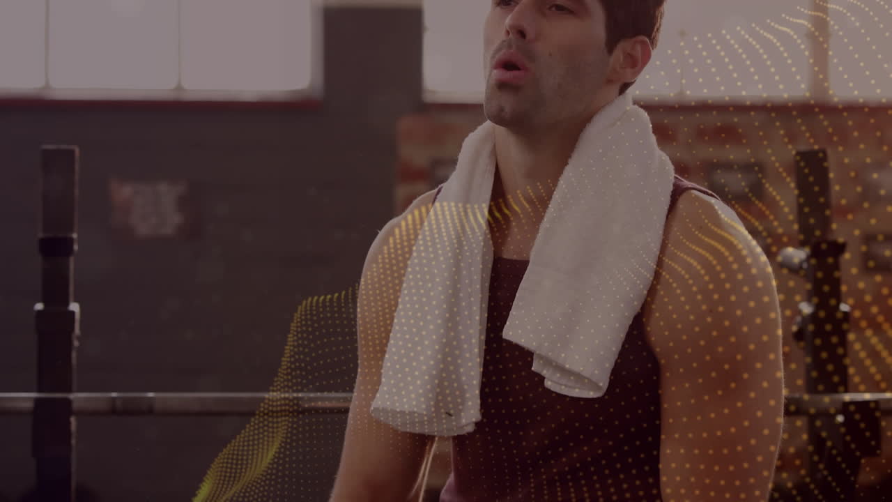 animación de puntos en movimiento sobre hombre en forma haciendo ejercicio en el gimnasio