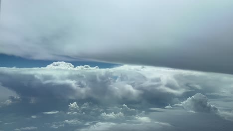 pilot pov flying across a stormy sky plenty of storm clouds