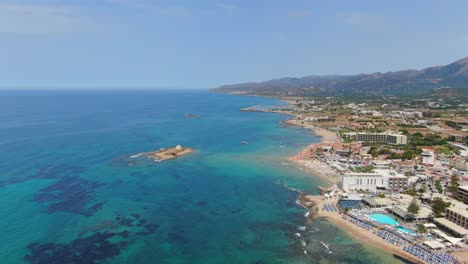 turquoise water coastline with resorts on the waterfront