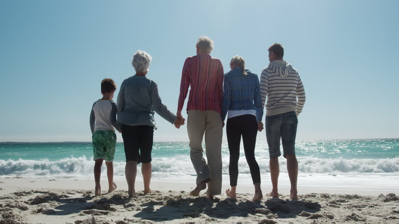 Family enjoying free time on the beach together