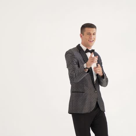 cheerful toast-master is gesticulating and posing at the celebration. parody of the show program of leading
