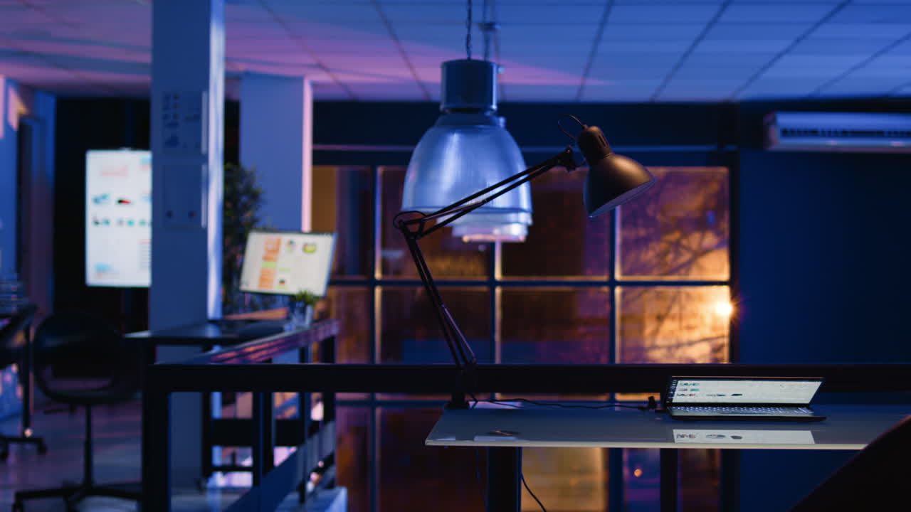 Office interior with laptop and desk