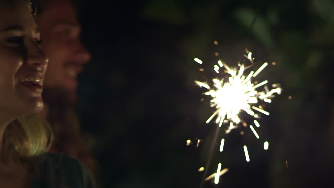 Holding Sparklers and Enjoying Music