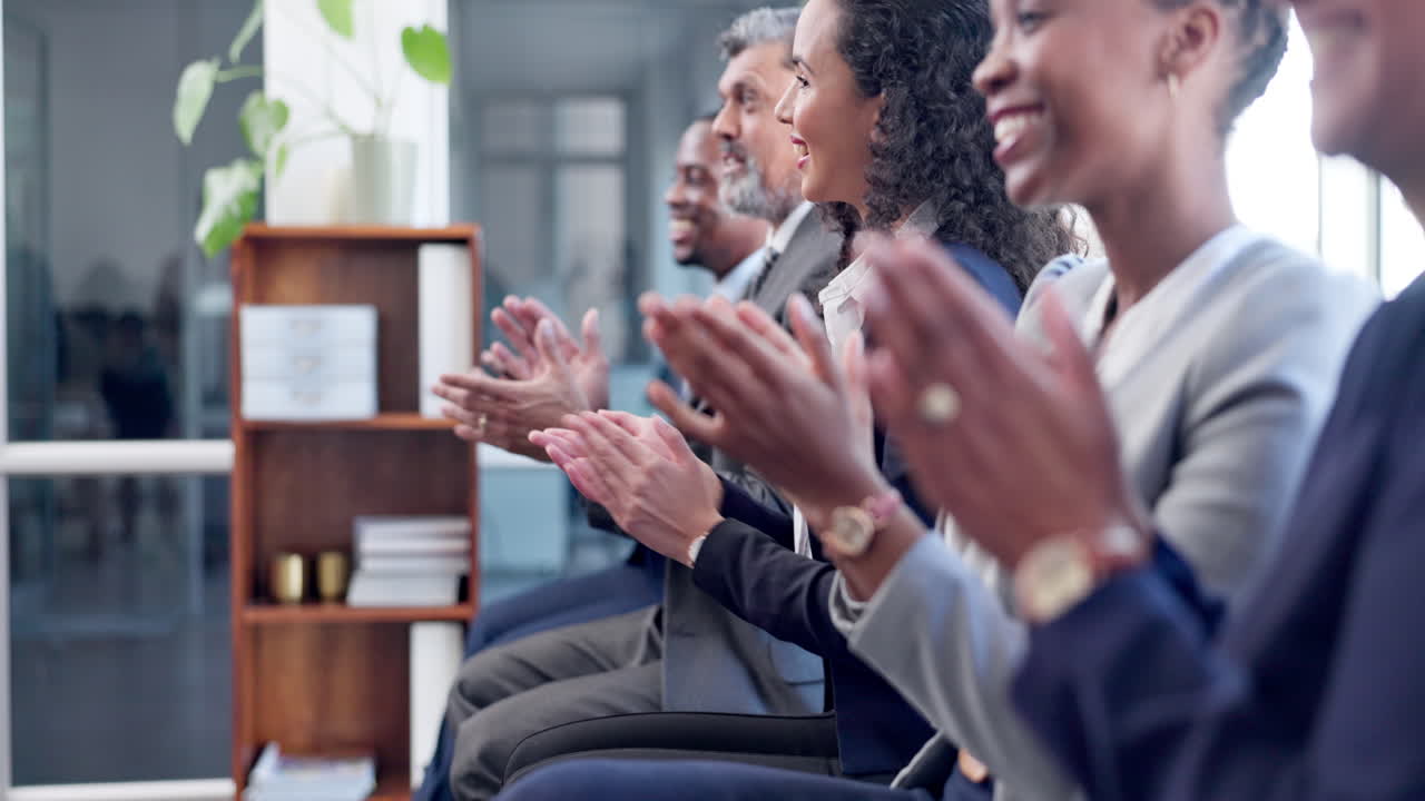 Happy business people, applause