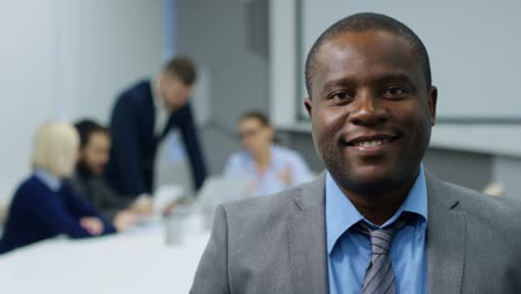 african entrepreneur smiling at camera