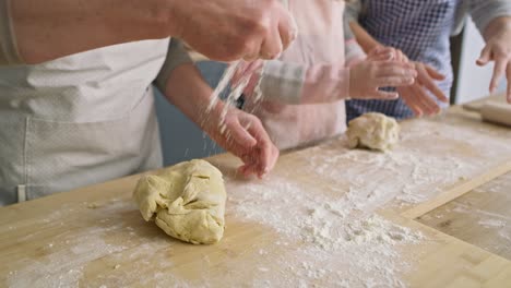 close up video of sprinkling flour and kneading dough