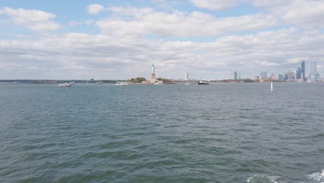 new york usa landmark, statue of liberty in upper bay, view from staten island ferry