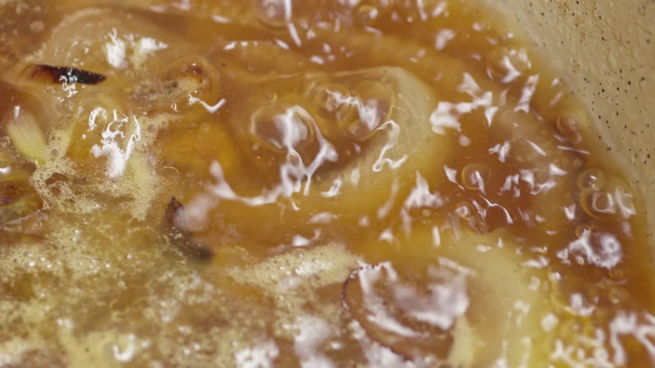 Close-Up, Onion Soup Boiling in Hot Pot, Cooking Process of Savory Meal