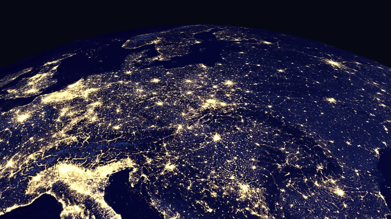 Un'animazione digitale zooma dallo spazio su una vista notturna dell'Europa con le luci brillanti delle città.