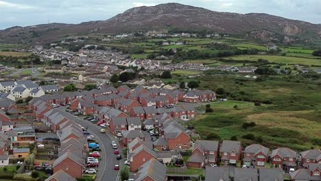 welsh townhouse modern property aerial view establishing decent over rocky mountain neighbourhood