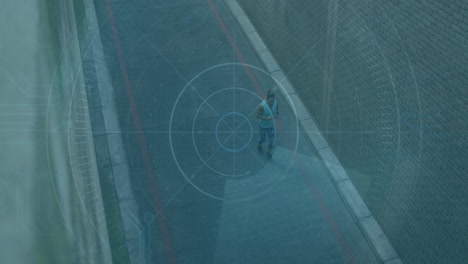 Walking on street, person with digital target overlay animation displayed