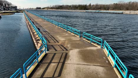 descending the drone over the cement boardwalk on the channel