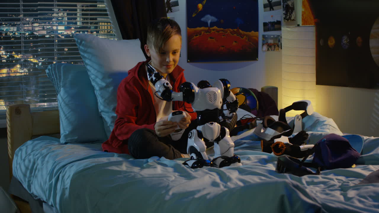 Boy Playing with a Robot Toy in His Bedroom at Night