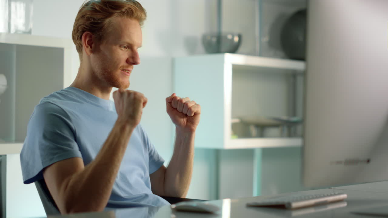 Worker talking online celebrating success results at remote office close up.