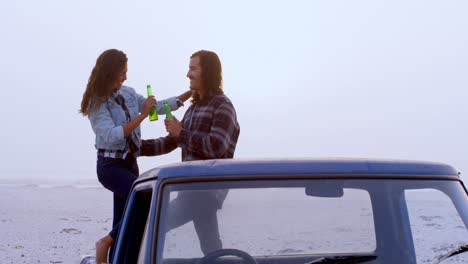 couple having beer in the car 4k