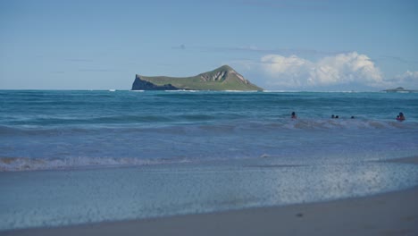 Tourists-body-surfing-the-waves-coming-to-shore