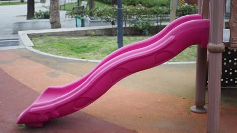 pink slide on a playground