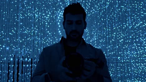 A captivating scene of a photographer immersed in the mesmerizing light art installation at TeamLab Planets in Tokyo.