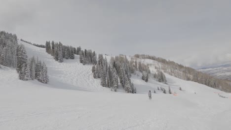 skilful snowboarder enjoy snow slopes, aspen, colorado
