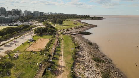 Aerial-view-of-La-Plata-river-shore-at-Vicente-Lopez-costal-walk-in-Buenos-Aires