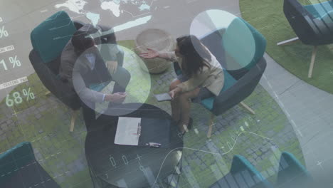 Animation of data processing over two business people discussing