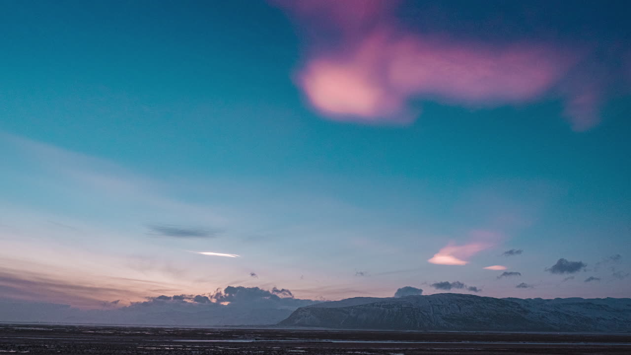 Polar Stratospheric Clouds During Sunset Over Vatnajokull Glacier Cap In South Iceland.  - timelapse