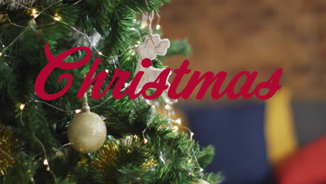 christmas text animation over decorated tree with ornaments and lights