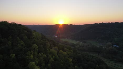 sunrise over valley and forest