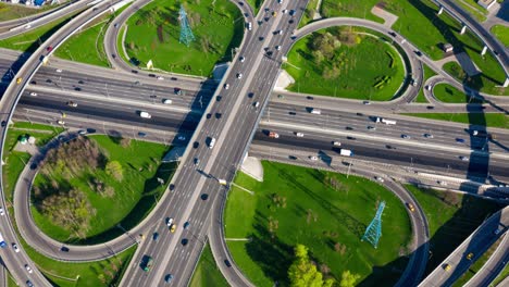 timelapse aerial view of a freeway intersection traffic trails in moscow.