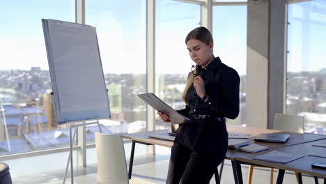 Young business woman thinking about new project.