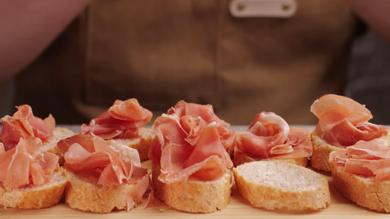 Preparing Serrano Ham Toasts