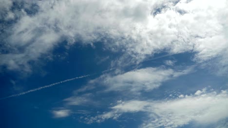 clouds are moving in the blue sky. timelapse