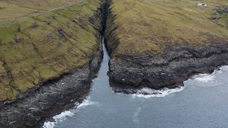 aerial tilt up of scenic landscape on streymoy, norðaradalur, faroe islands