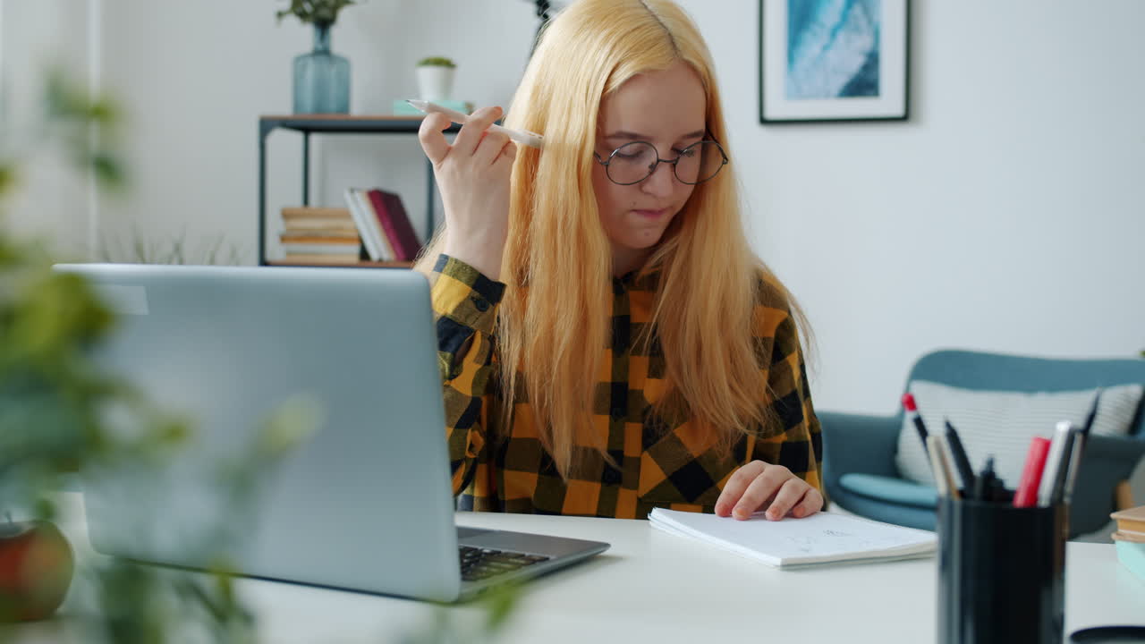 Teenage Girl Studying at Home