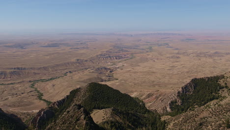 stunning aerial perspective of jagged rock outcrops and deep canyons in the western united states.