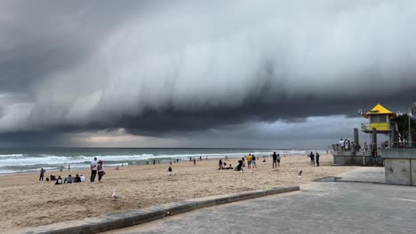 crazy storm season approaching, the sky covered in dark stormy clouds at surfers paradise, gold coast, queensland, australia