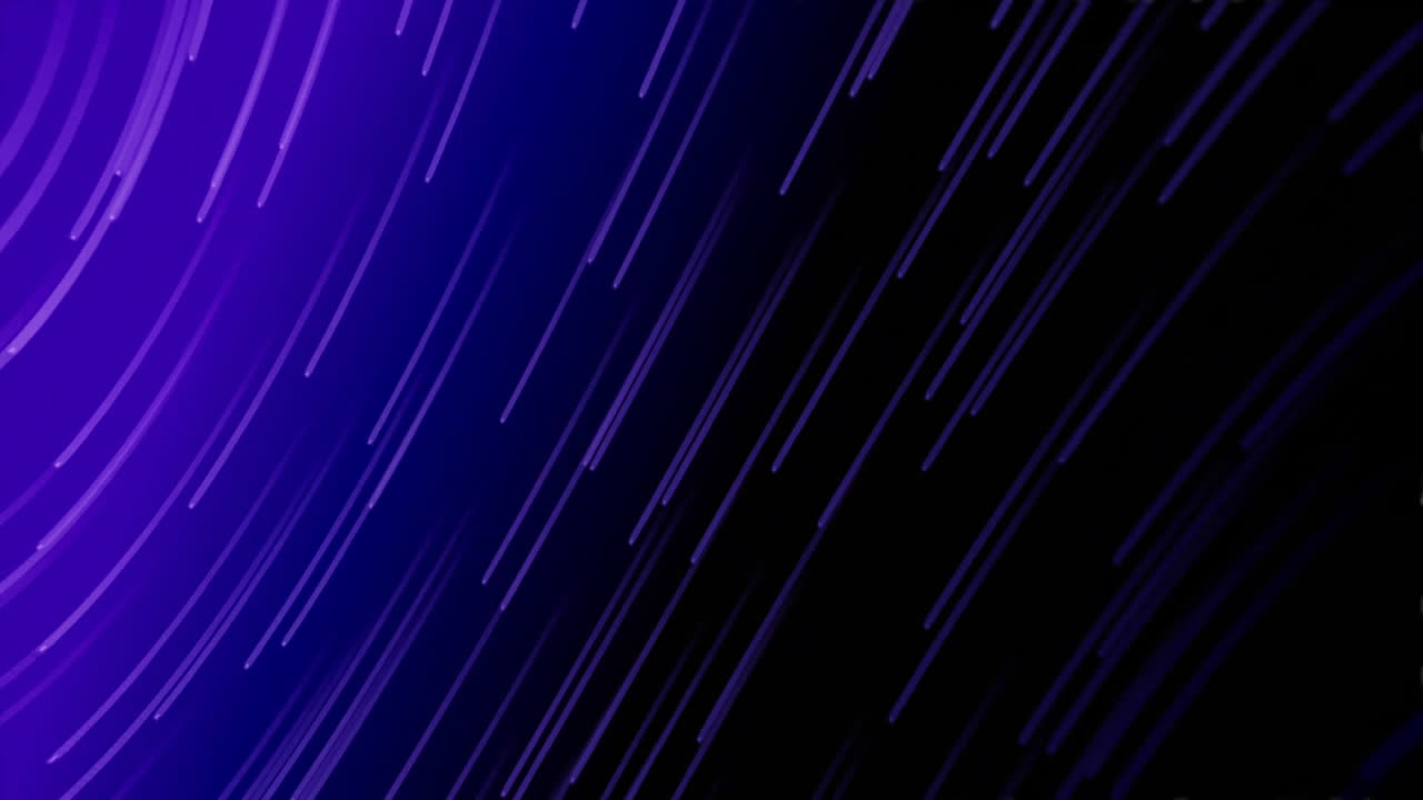 Animation of light trails on black background