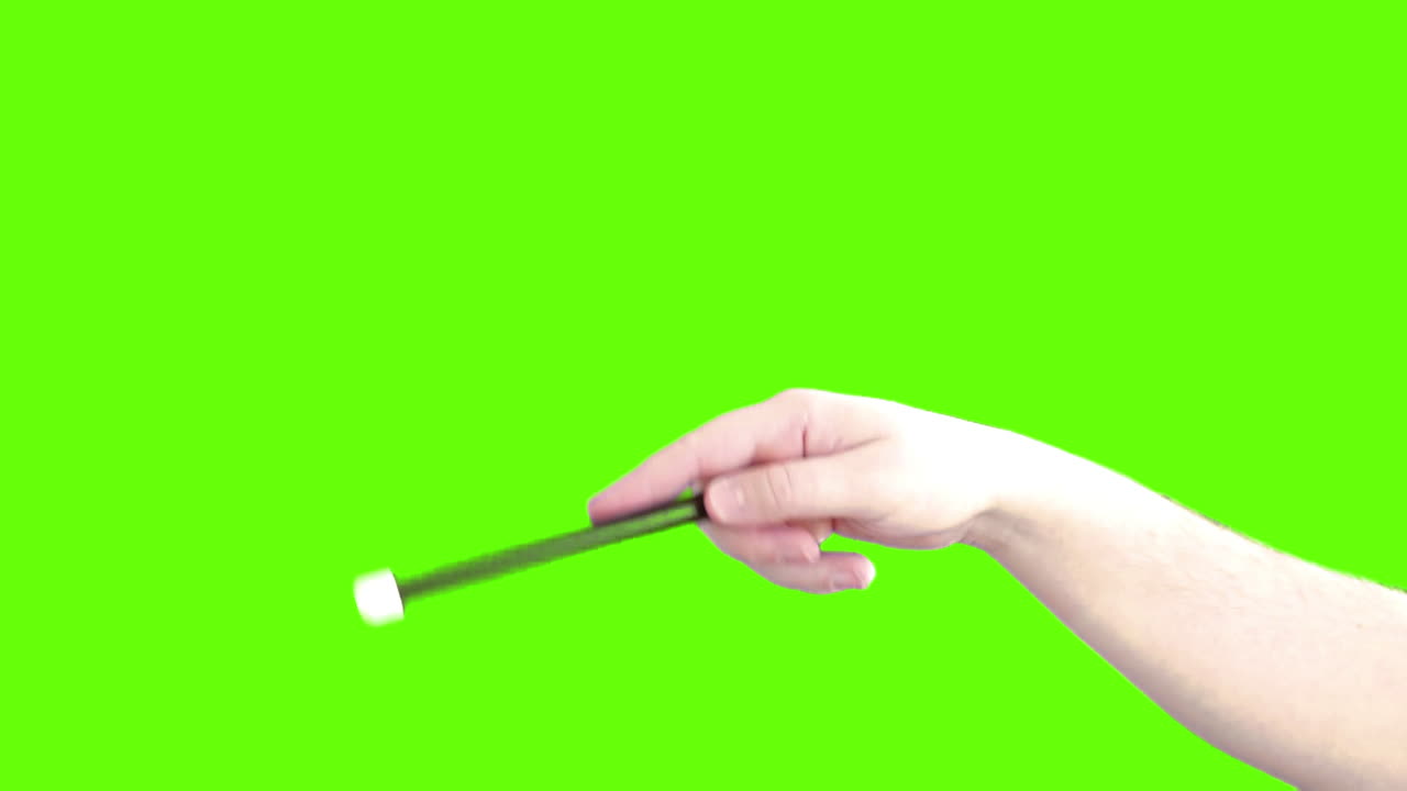 Hand Holding a Pointer or Wand on Green Screen