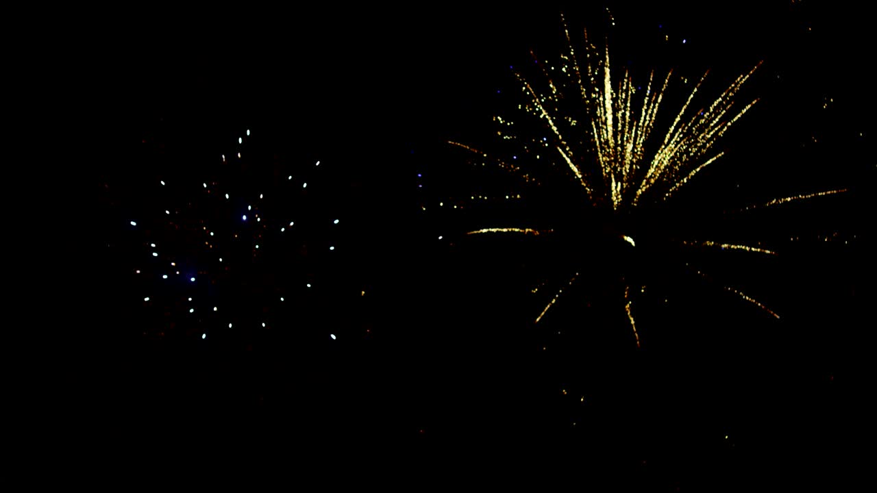 Colorful Fireworks Display on the Black Screen Background. Powerful Explosion of Pyrotechnics. Real Lens Flare FX Special Effect. Easy to Use in Blend / Overlay Modes.