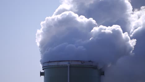 industrial factory smoke into the atmosphere, smokestack exhaust