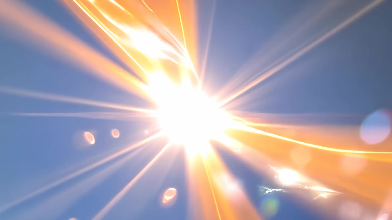 Sol Brillante en Cielo Azul Despejado con Destello de Lente