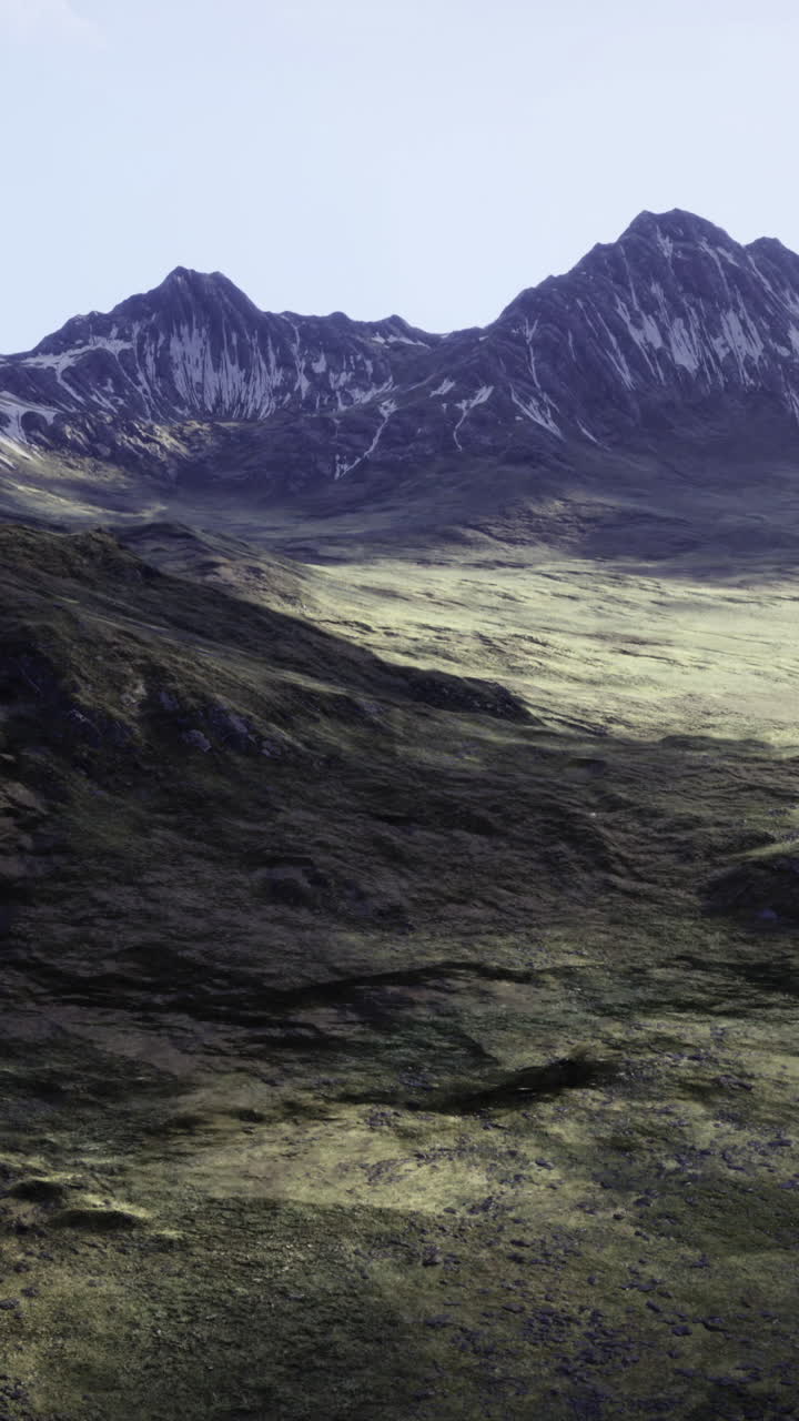 Majestic mountain landscape with rugged terrain and snow capped peaks