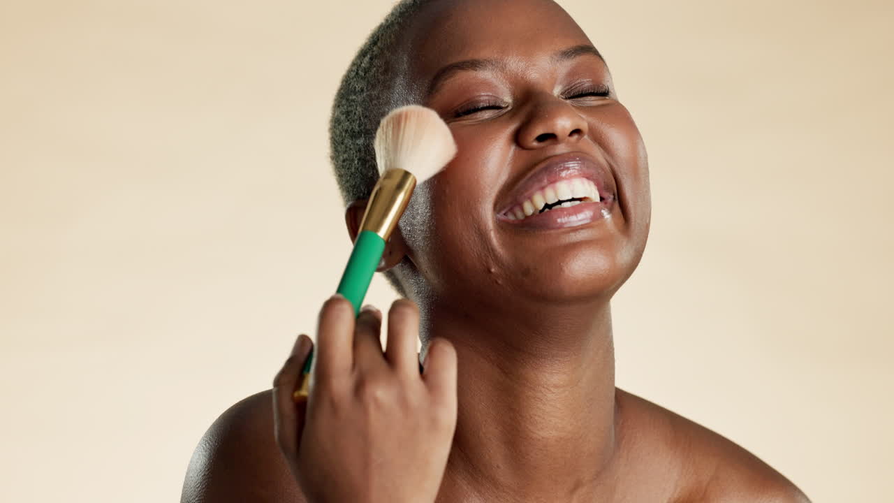 Beauty, makeup and black woman with a brush