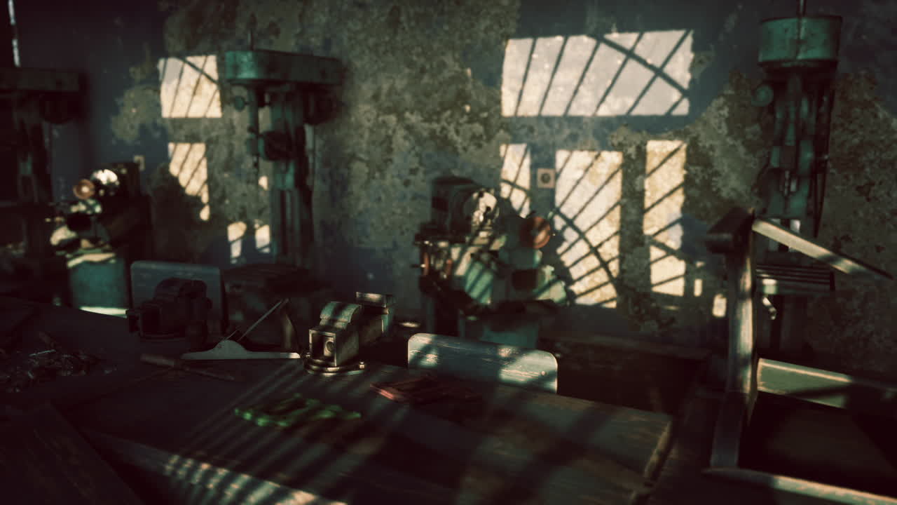 Abandoned workshop with vintage machinery illuminated by sunlight