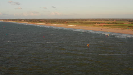 Kitesurfers-near-the-beach-of-Domburg-during-sunset